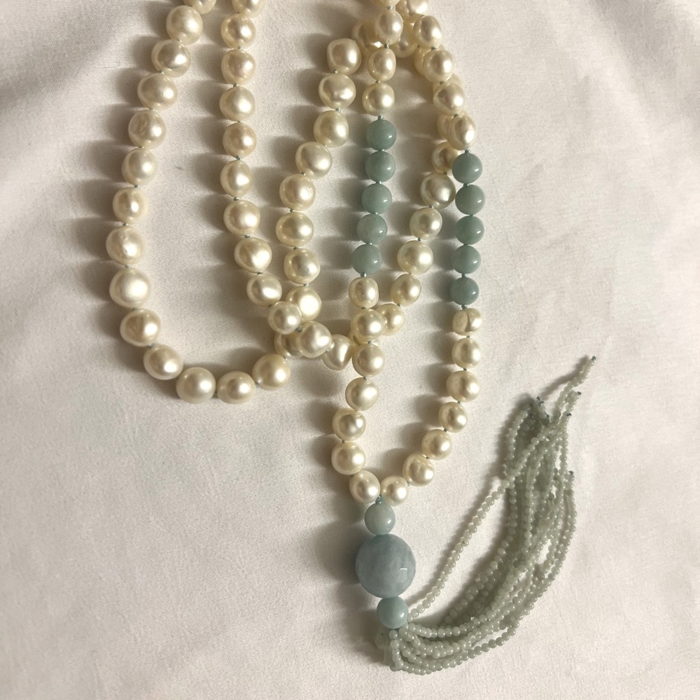 Long pearl and jade strand necklace